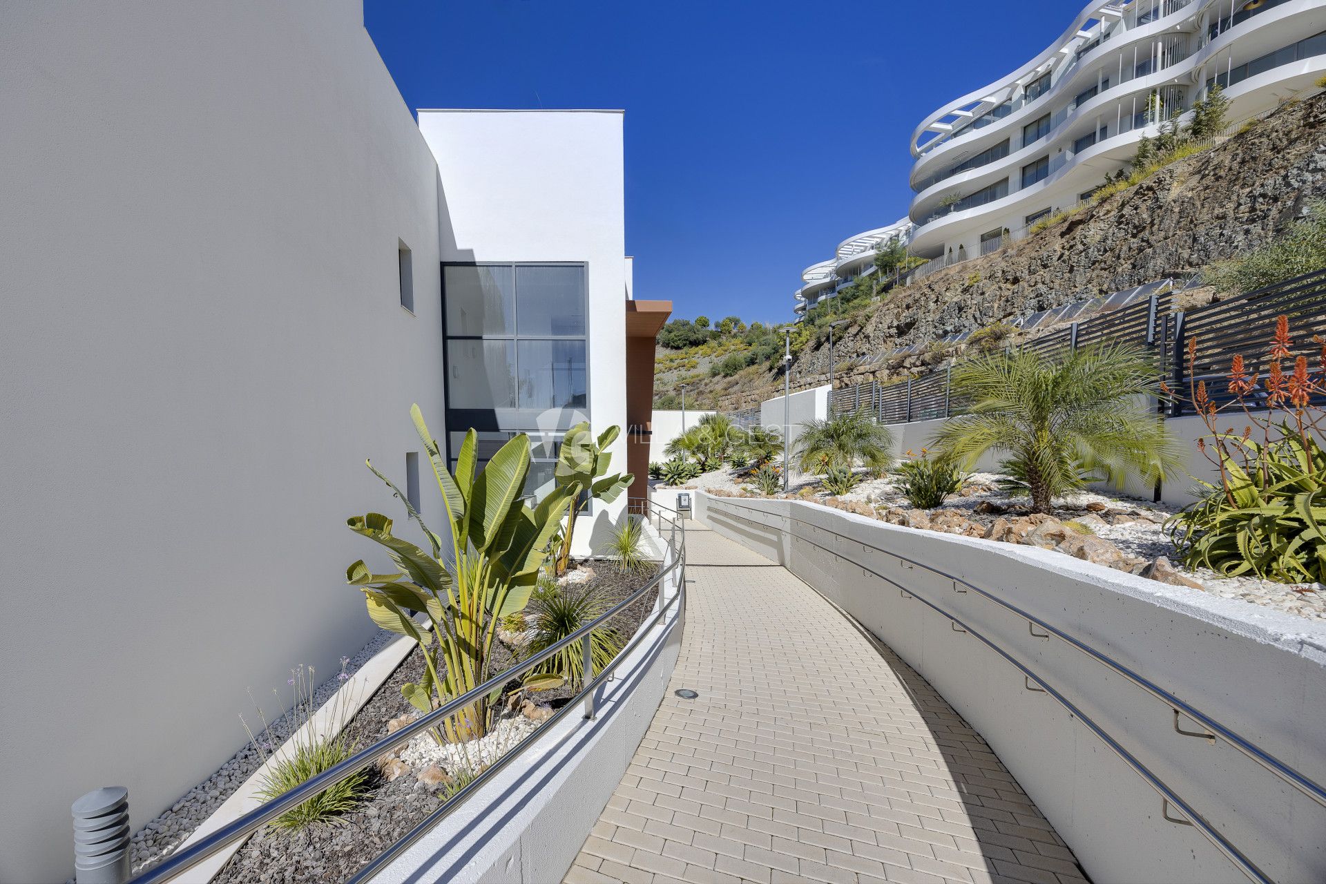 Corner Contemporary Large Apartment with Open Sea Views in Benahavis